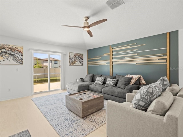 9617 Branching Ship Trce, Wesley Chapel, FL 33545 - living area featuring a ceiling fan, wood finished floors, and visible vents