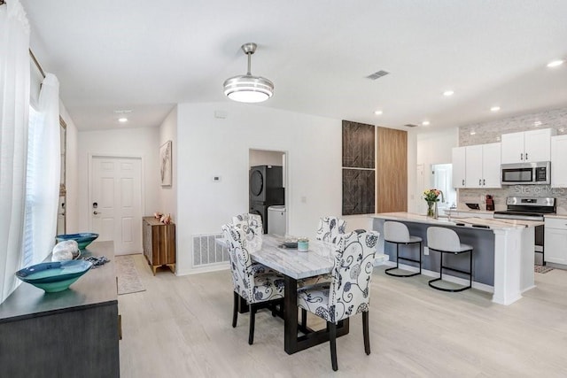 9617 Branching Ship Trce, Wesley Chapel, FL 33545 - dining area featuring recessed lighting, visible vents, and light wood-type flooring