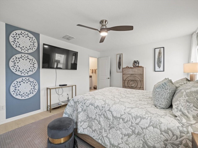 9617 Branching Ship Trce, Wesley Chapel, FL 33545 - bedroom featuring ceiling fan, baseboards, wood finished floors, and visible vents