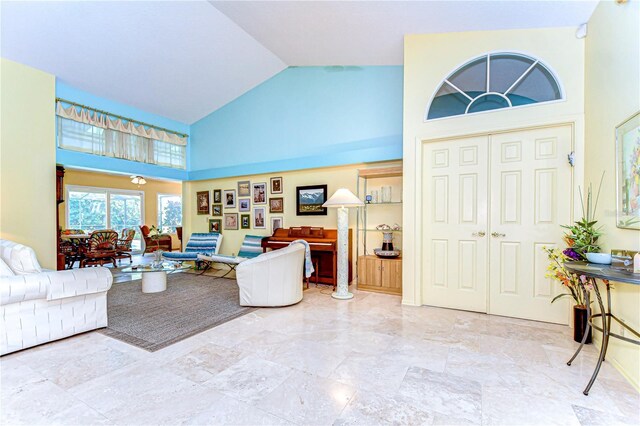 14119 Stonegate Dr, Tampa, FL 33624 - living area featuring high vaulted ceiling