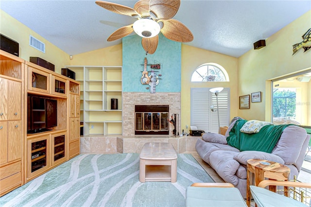 14119 Stonegate Dr, Tampa, FL 33624 - living area featuring visible vents, ceiling fan, vaulted ceiling, and a healthy amount of sunlight