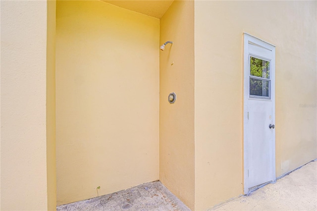 14119 Stonegate Dr, Tampa, FL 33624 - doorway to property with stucco siding