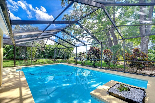 14119 Stonegate Dr, Tampa, FL 33624 - outdoor pool featuring glass enclosure