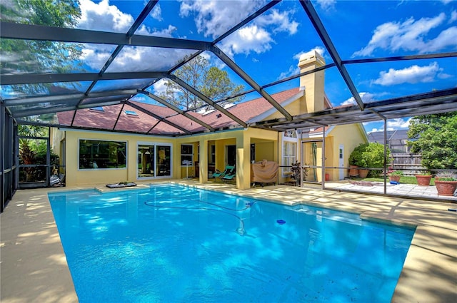 14119 Stonegate Dr, Tampa, FL 33624 - pool featuring glass enclosure and a patio