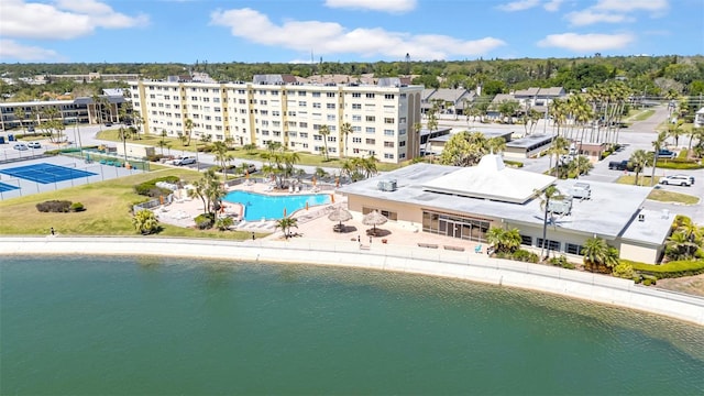 4725 Cove Cir Unit 302, Saint Petersburg, FL 33708 - drone / aerial view of a pool area and a nearby body of water