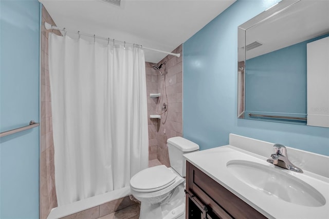 4725 Cove Cir Unit 302, Saint Petersburg, FL 33708 - bathroom featuring toilet, vanity, and a shower with curtain