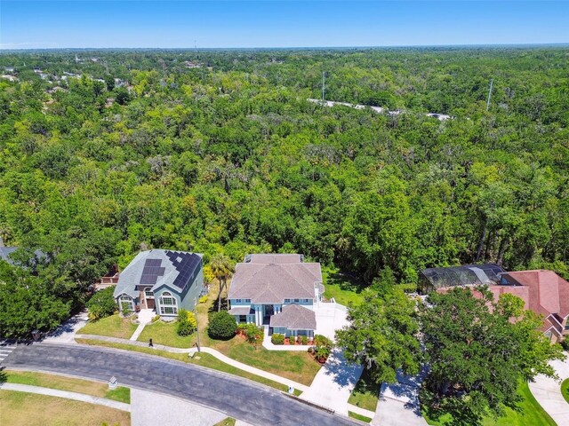 aerial view featuring a forest view