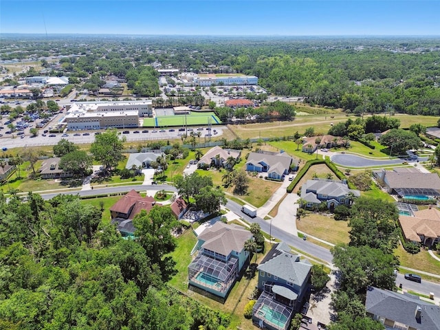 birds eye view of property with a residential view