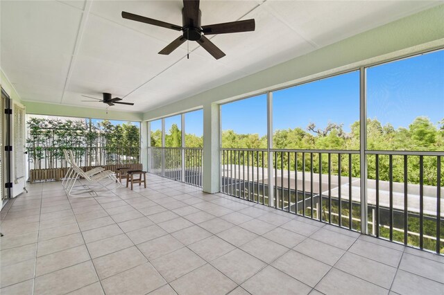 13310 Waterford Run Dr, Riverview, FL 33569 - sunroom featuring a ceiling fan and tile patterned floors