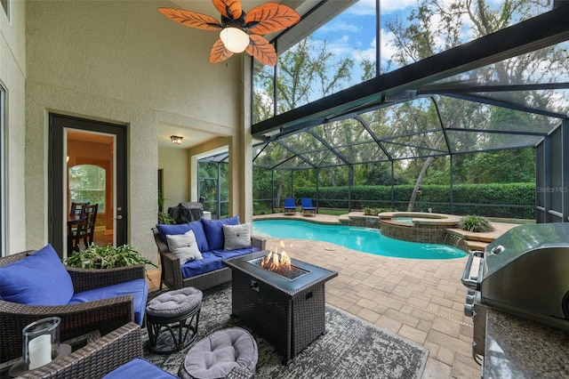 view of swimming pool with a pool with connected hot tub, area for grilling, a lanai, outdoor lounge area, and a patio area