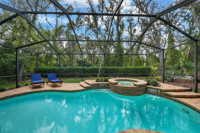 view of swimming pool with glass enclosure, a pool with connected hot tub, and a patio area