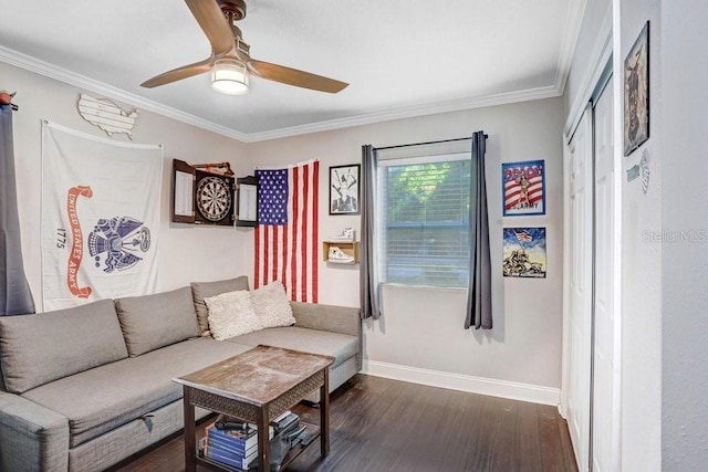 2001 E Idlewild Ave, Tampa, FL 33610 - living area with dark wood finished floors, baseboards, ornamental molding, and a ceiling fan