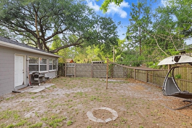 2001 E Idlewild Ave, Tampa, FL 33610 - view of yard with a fenced backyard