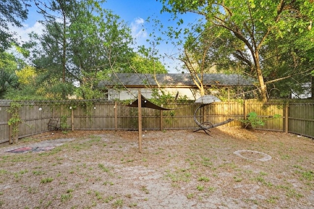 2001 E Idlewild Ave, Tampa, FL 33610 - view of yard with a fenced backyard