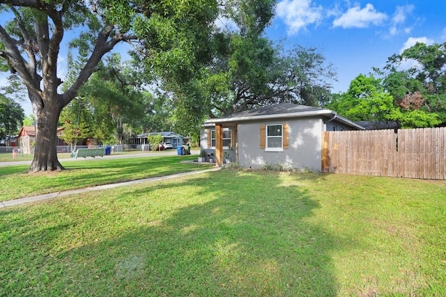 2001 E Idlewild Ave, Tampa, FL 33610 - view of yard featuring fence