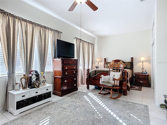 3625 Gaviota Dr, Ruskin, FL 33573 - bedroom with tile patterned floors, ceiling fan, and multiple windows