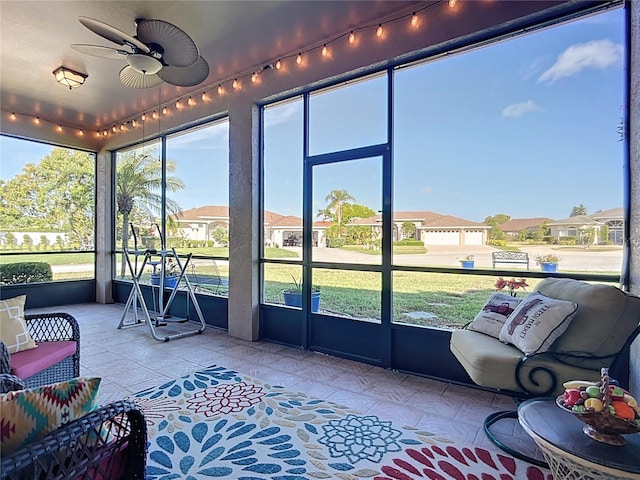 3625 Gaviota Dr, Ruskin, FL 33573 - sunroom featuring ceiling fan and a residential view