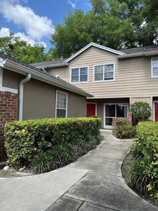 665 Oak Harbour Dr Unit 115, Altamonte Springs, FL 32701 - view of front facade featuring brick siding