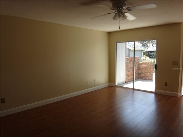 665 Oak Harbour Dr Unit 115, Altamonte Springs, FL 32701 - empty room featuring dark wood-style flooring, baseboards, and a ceiling fan