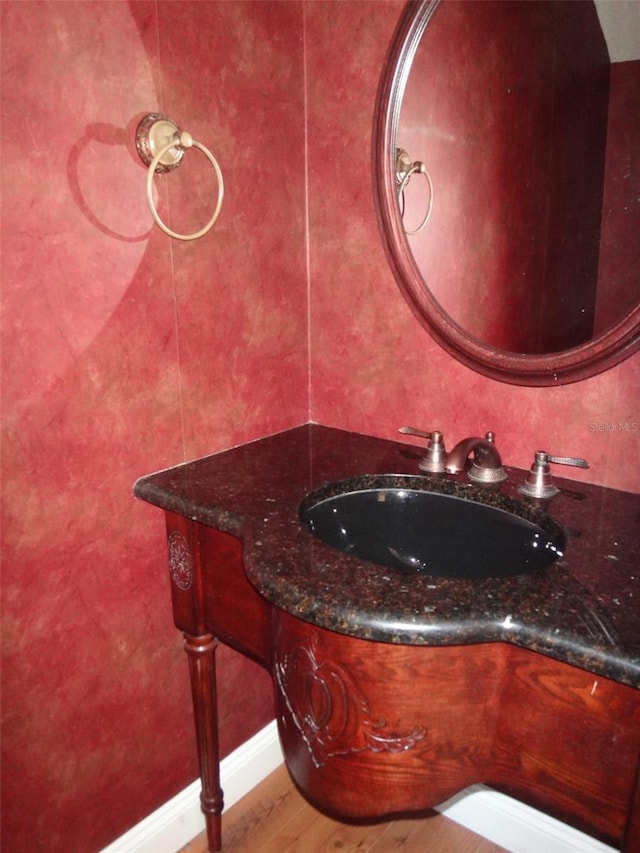 665 Oak Harbour Dr Unit 115, Altamonte Springs, FL 32701 - bathroom featuring vanity and wood finished floors