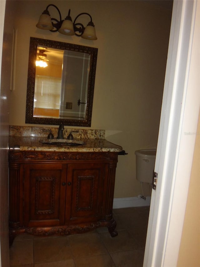 665 Oak Harbour Dr Unit 115, Altamonte Springs, FL 32701 - bathroom featuring tile patterned flooring, vanity, baseboards, and toilet