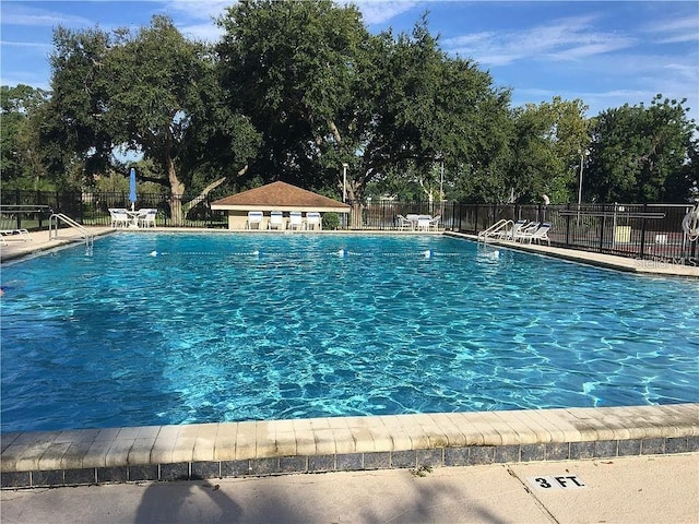 665 Oak Harbour Dr Unit 115, Altamonte Springs, FL 32701 - pool featuring fence and a patio