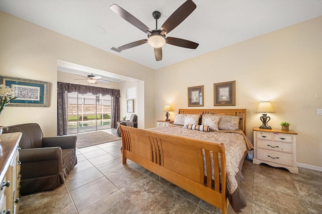 bedroom featuring baseboards, a ceiling fan, visible vents, and access to outside