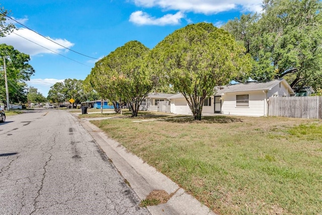 129 NW Lincoln Cir N, Saint Petersburg, FL 33702 - view of road with traffic signs