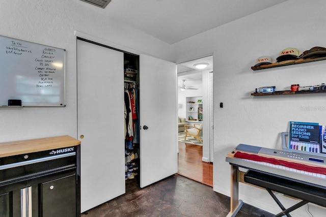 129 NW Lincoln Cir N, Saint Petersburg, FL 33702 - interior space with ceiling fan and baseboards