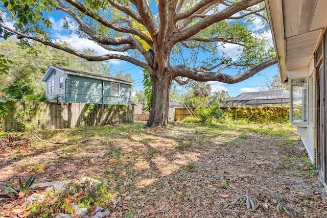 129 NW Lincoln Cir N, Saint Petersburg, FL 33702 - view of yard with a fenced backyard
