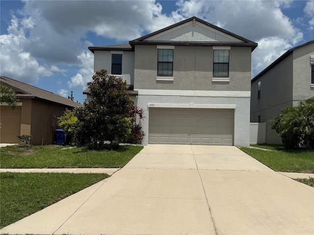 13923 Arbor Pines Dr, Riverview, FL 33579 - traditional-style house featuring stucco siding, concrete driveway, and an attached garage