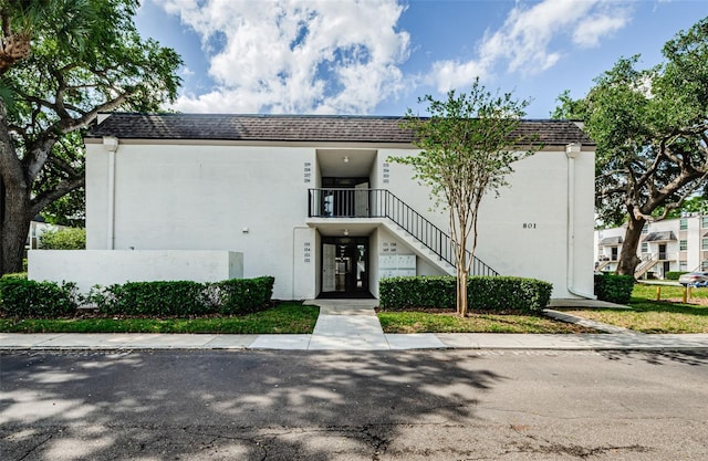 view of property with stairway