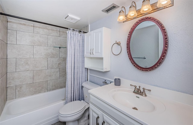 full bath featuring vanity, toilet, visible vents, and shower / bath combo with shower curtain