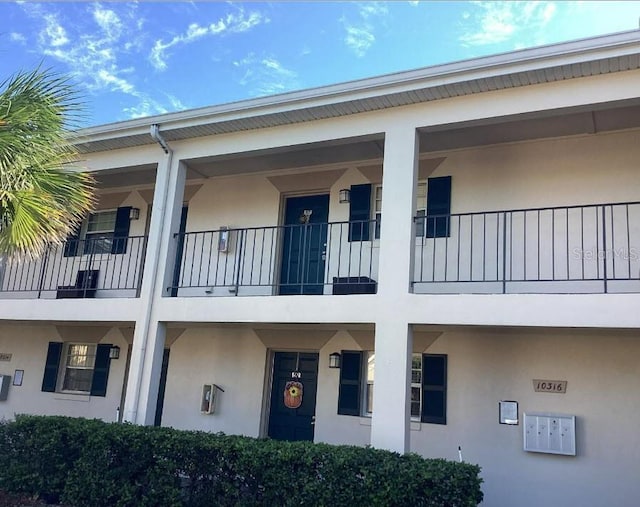 10316 Carrollwood Ct Unit 57, Tampa, FL 33618 - exterior space with stucco siding