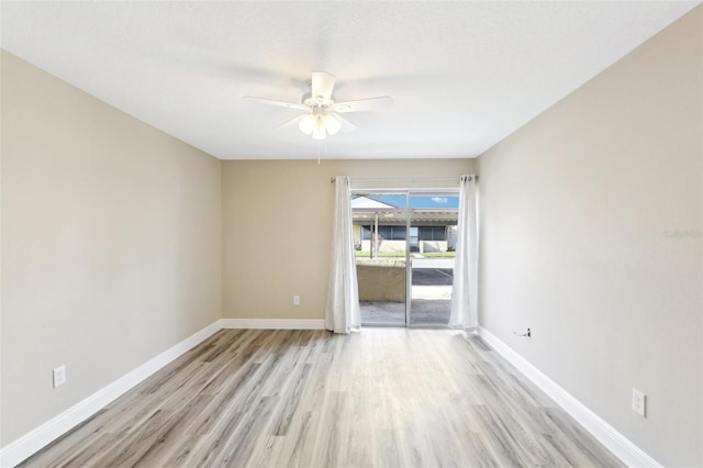 1203 16th Cir SE, Largo, FL 33771 - spare room with light wood-style floors, a ceiling fan, and baseboards