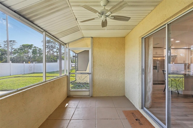 1203 16th Cir SE, Largo, FL 33771 - unfurnished sunroom featuring ceiling fan and vaulted ceiling