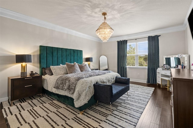 bedroom featuring crown molding, an inviting chandelier, baseboards, and dark wood finished floors