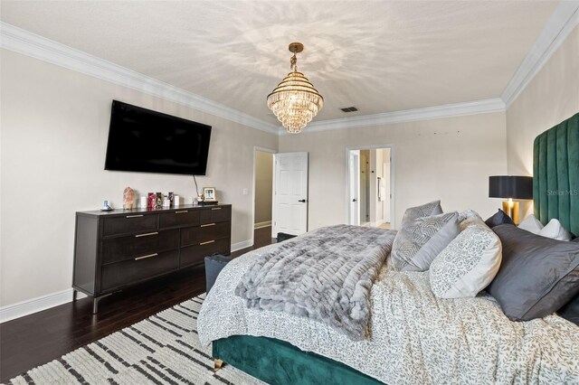 bedroom featuring visible vents, baseboards, an inviting chandelier, dark wood-style flooring, and ornamental molding
