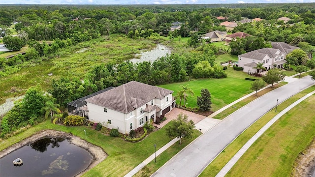 aerial view with a wooded view