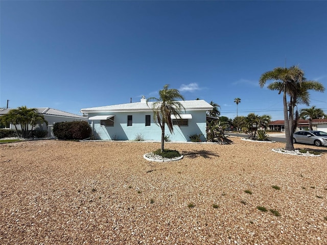 195 45th Ave, St Pete Beach, FL 33706 - view of home's exterior with stucco siding