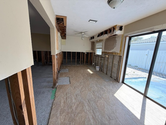 195 45th Ave, St Pete Beach, FL 33706 - unfurnished room featuring plenty of natural light and a ceiling fan