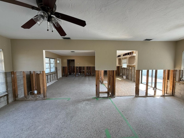 195 45th Ave, St Pete Beach, FL 33706 - empty room with a ceiling fan and a textured ceiling