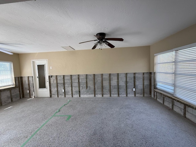 195 45th Ave, St Pete Beach, FL 33706 - empty room with a ceiling fan, carpet flooring, and a textured ceiling