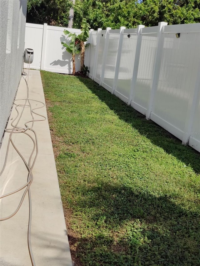 6690 54th Ave N, Saint Petersburg, FL 33709 - view of yard featuring a fenced backyard