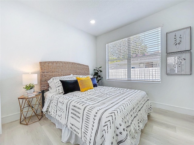 2711 W Cordelia St, Tampa, FL 33607 - bedroom with recessed lighting, baseboards, and wood finished floors