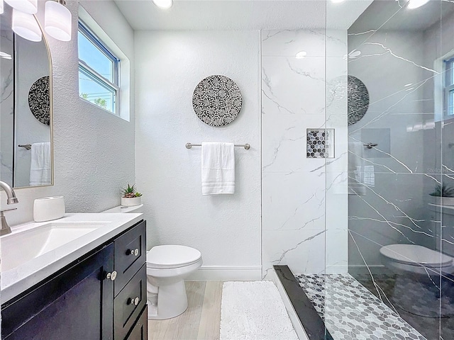 2711 W Cordelia St, Tampa, FL 33607 - full bathroom with a marble finish shower, toilet, vanity, and a textured wall