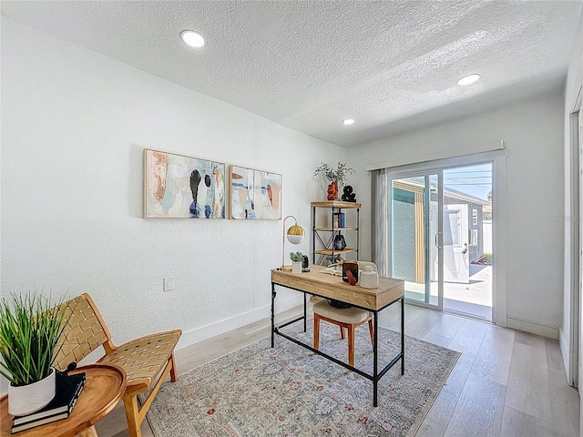 2711 W Cordelia St, Tampa, FL 33607 - office area featuring a textured ceiling, recessed lighting, baseboards, and light wood-style floors