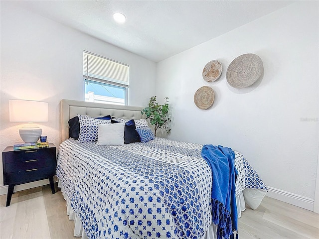 2711 W Cordelia St, Tampa, FL 33607 - bedroom featuring baseboards and wood finished floors