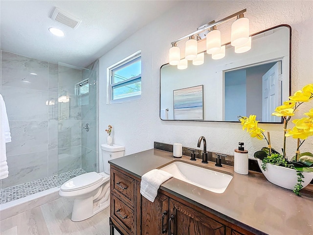 2711 W Cordelia St, Tampa, FL 33607 - full bathroom with visible vents, toilet, a shower stall, and vanity