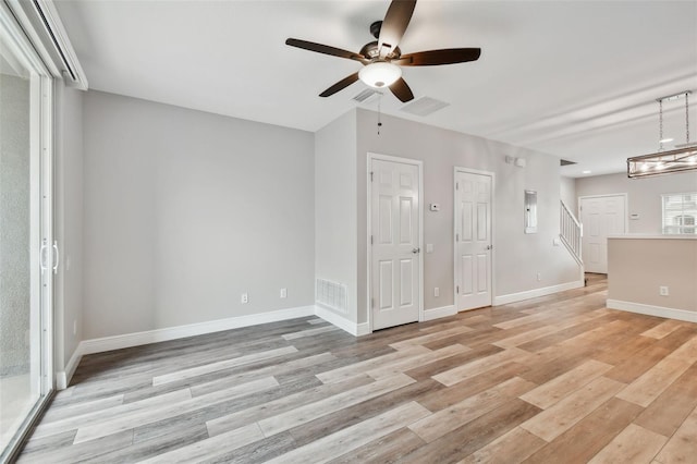 10407 Westpark Preserve Blvd, Tampa, FL 33625 - unfurnished room with ceiling fan, light wood-style flooring, and baseboards